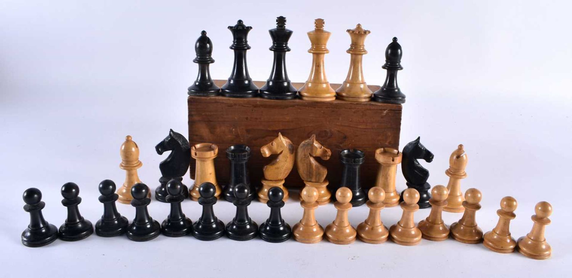 A BOXWOOD AND EBONY CHESS SET. Largest 8 cm high. (qty)