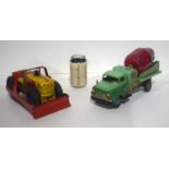 A 1960's battery operated Tin Super Mixer toy together with a Marx Caterpillar Earth Mover largest