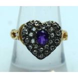 A Boxed Diamond and Amethyst Heart Shaped Ring. Size O. weight 3g