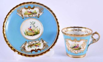 AN EARLY 19TH CENTURY CHAMBERLAINS WORCESTER CUP AND SAUCER painted with birds within gilt