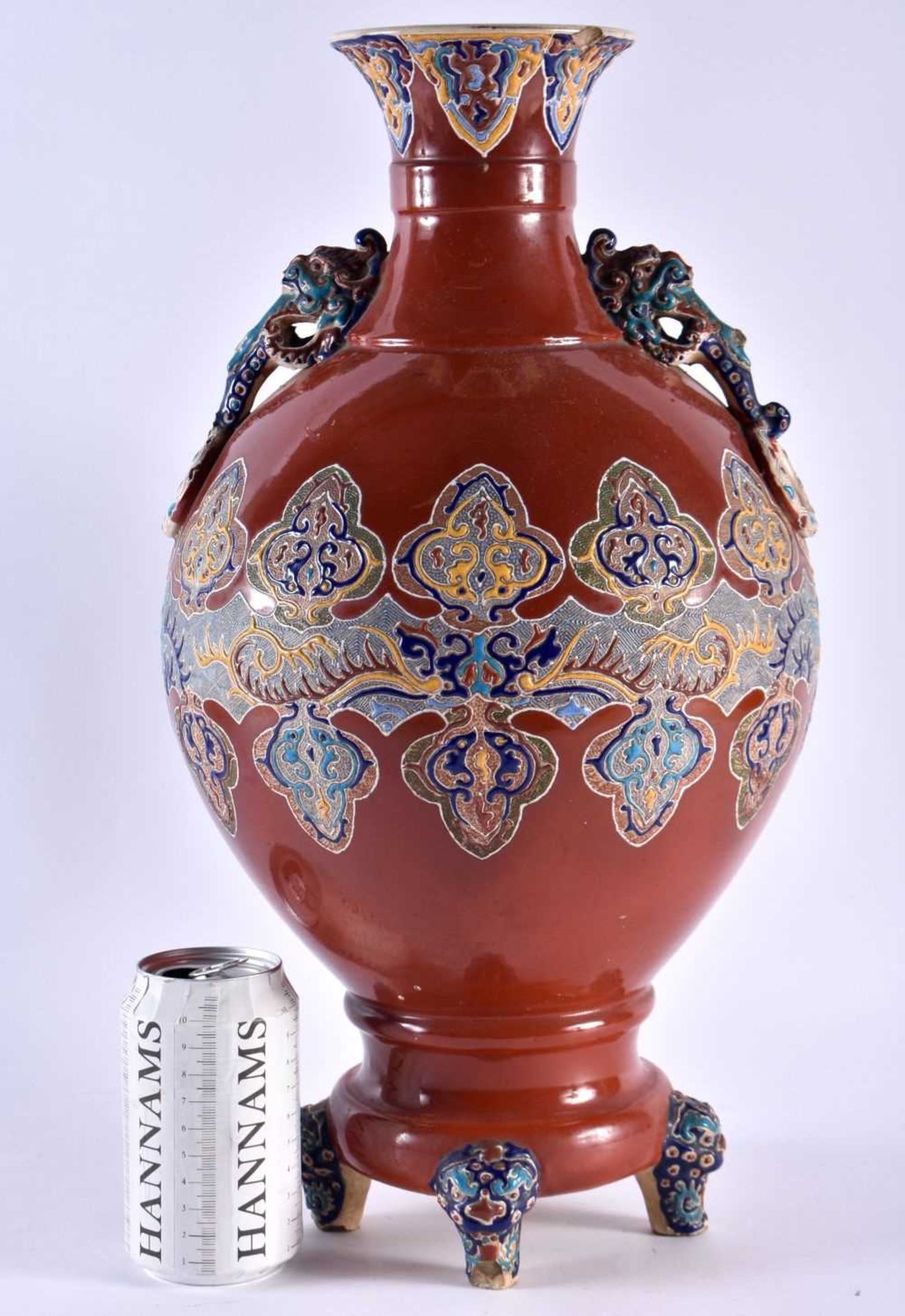 A LARGE 19TH CENTURY JAPANESE MEIJI PERIOD TWIN HANDLED SATSUMA VASE enamelled with motifs, with