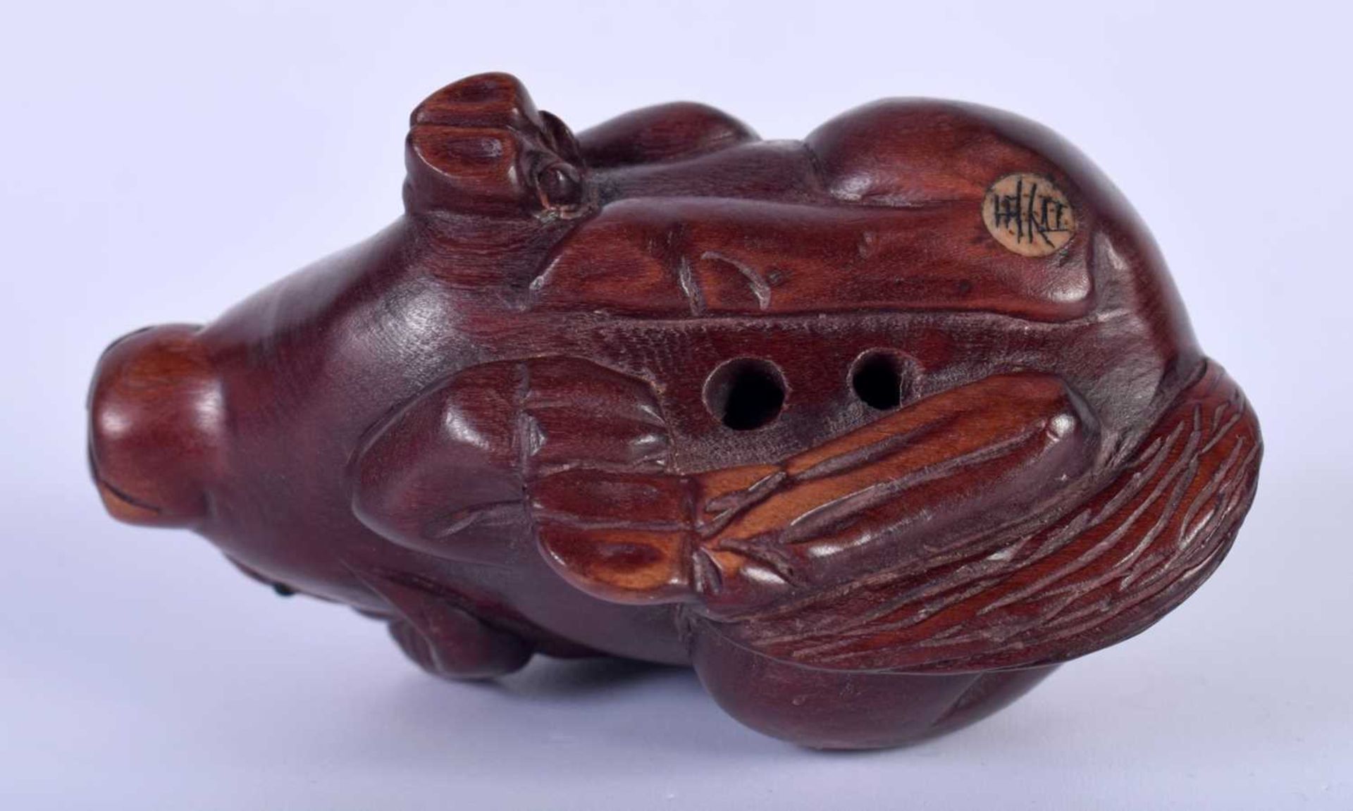 A Carved Hardwood Netsuke of an Ox. 4cm x 6cm x 3.4cm. Weight 29g - Image 3 of 3