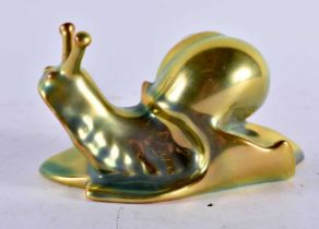 A HUNGARIAN ZSOLNAY PECS LUSTRE PORCELAIN FIGURE OF A SNAIL. 11 cm x 7 cm.