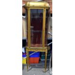 A Gilt wood and curved glass Display cabinet 192 x 65 cm.