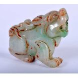 A Carved Jade Lion. 4.1cm x 4.5cm x 1.2cm. Weight 32.5g