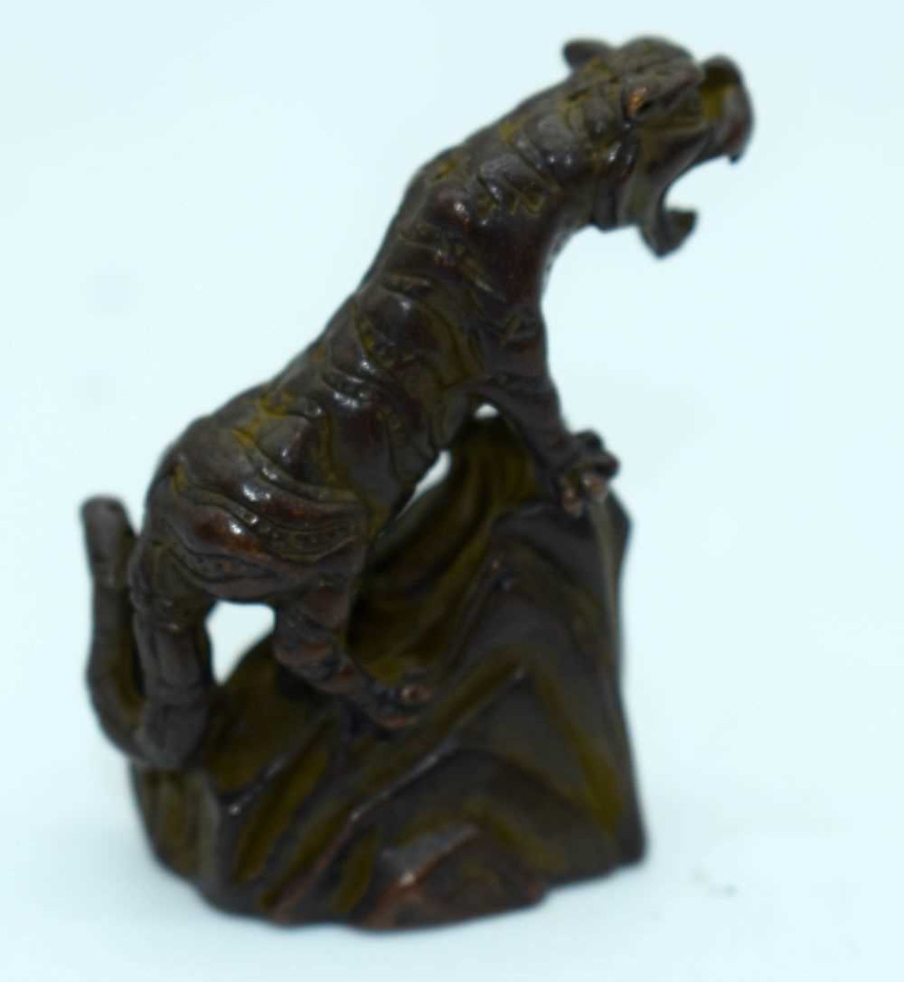 A Japanese Bronze Tiger on a Rock. 5.1cm x 1.9cm x 4.4cm. Weight 74.5g - Image 2 of 3