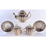 A LATE 18TH CENTURY ENGLISH PORCELAIN PART TEASET comprising of teapot & two twin handled cups,