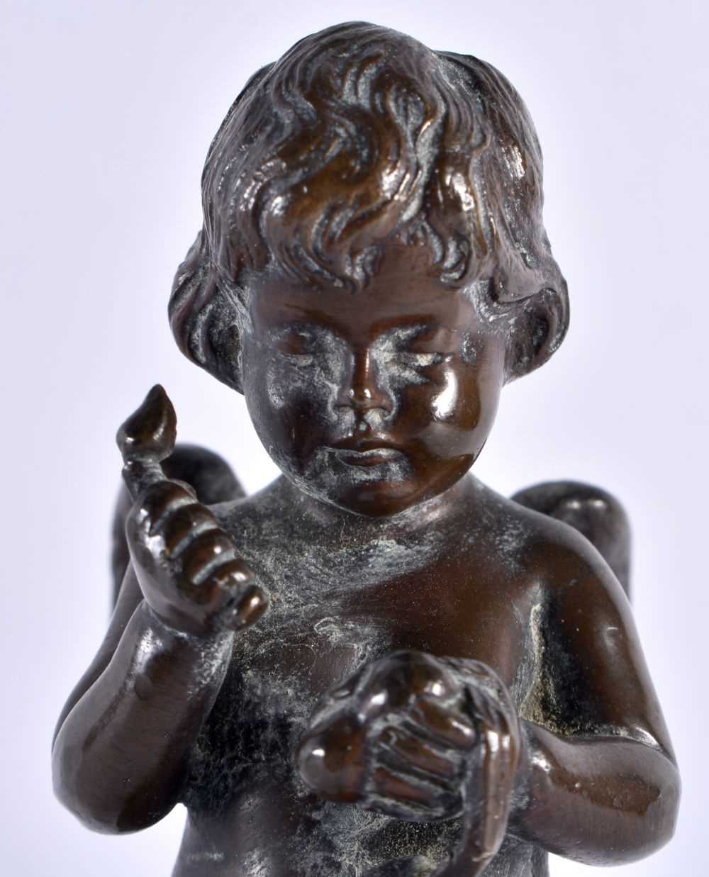 A 19TH CENTURY EUROPEAN GRAND TOUR BRONZE FIGURE OF A PUTTI modelled upon a marble plinth. 18 cm - Image 2 of 6