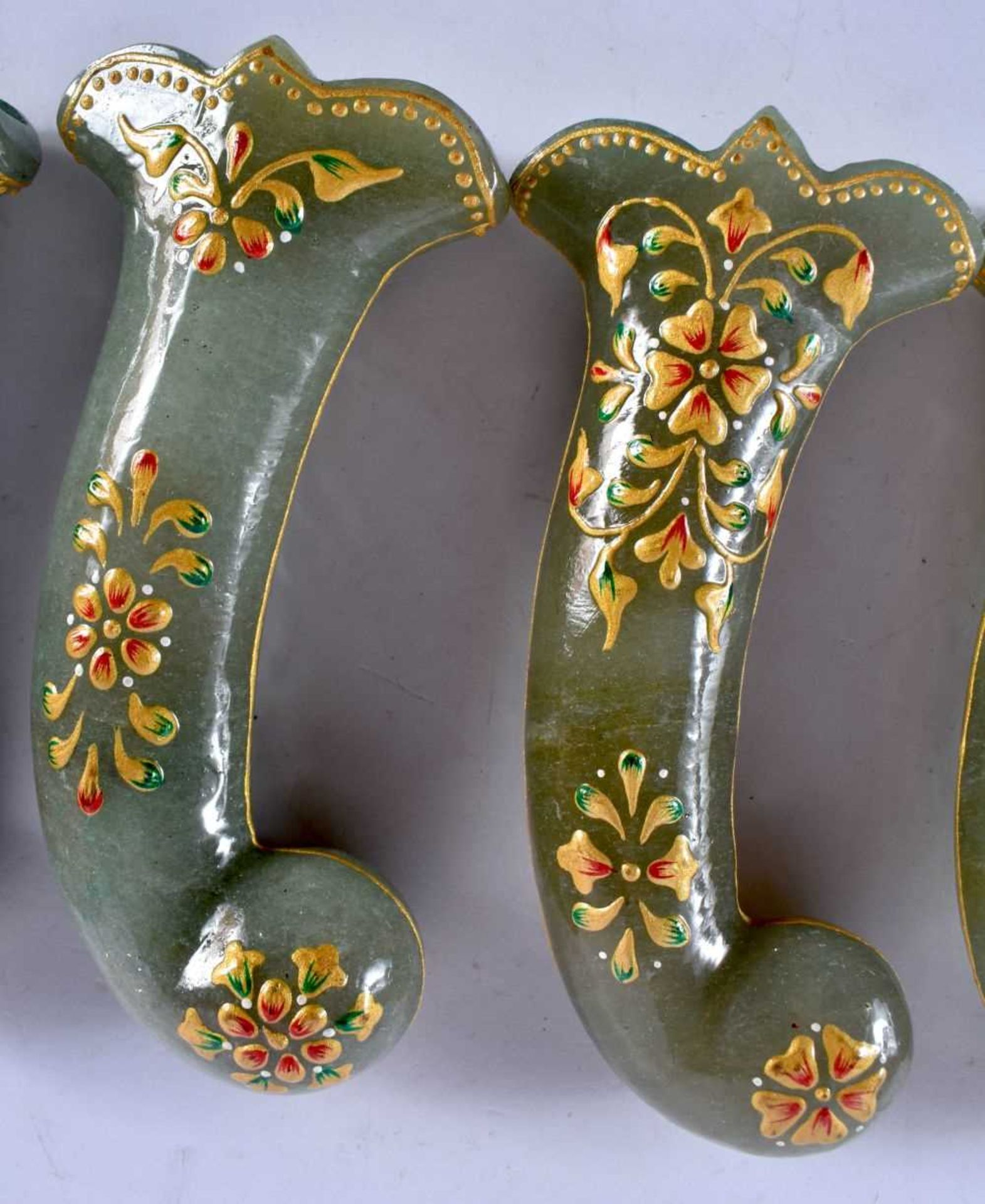 A SET OF FIVE MIDDLE EASTERN QAJAR LACQUER HARDSTONE DAGGER HANDLES overlaid with foliage and vines. - Image 3 of 6