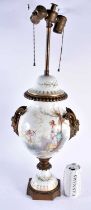 A LARGE LATE 19TH CENTURY FRENCH SEVRES STYLE PORCELAIN LAMP painted with cupid and a female. 63