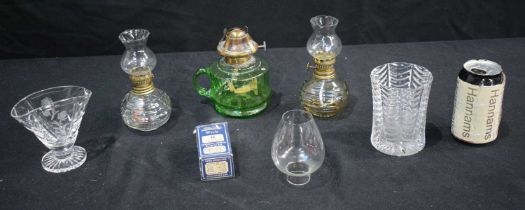 A collection of small oil lamps together with other glass items 23 cm (6).