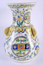 A MIDDLE EASTERN TURKISH FAENCE KUTAHYA MOSQUE VASE. 21 cm x 11 cm.