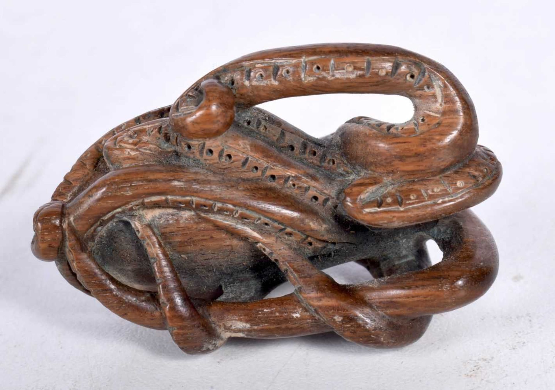 A Carved Wood Netsuke in the form of an Octopus Clinging to a Rock. 2.8cm x 5.1cm x 3.2cm, weight - Image 3 of 4