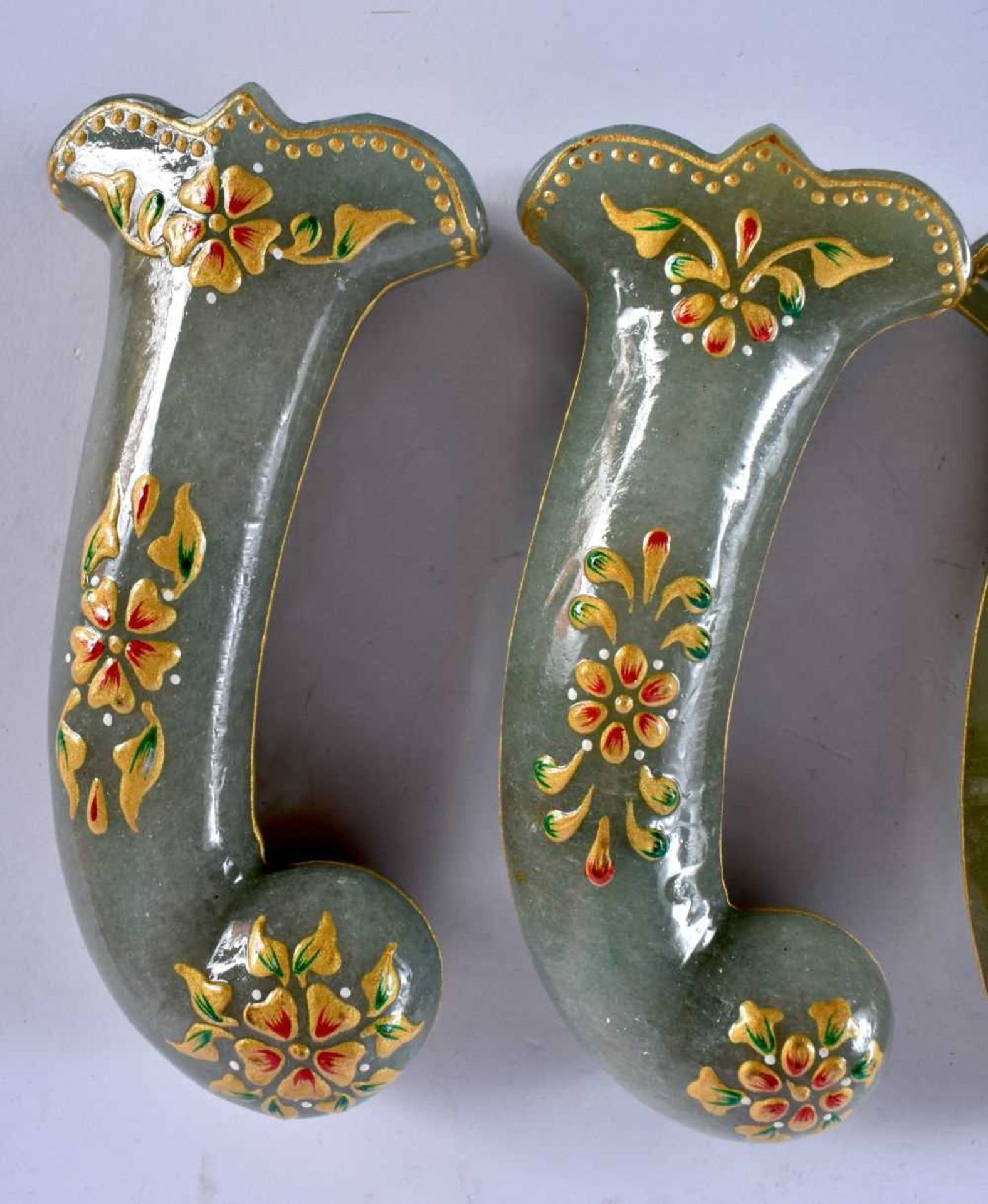 A SET OF FIVE MIDDLE EASTERN QAJAR LACQUER HARDSTONE DAGGER HANDLES overlaid with foliage and vines. - Image 4 of 6