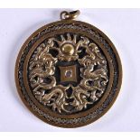 A CHINESE SILVER GILT PENDANT 20th Century. 32.3 grams. 5.25 cm wide.