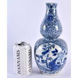 A LARGE 19TH CENTURY CHINESE BLUE AND WHITE PORCELAIN DOUBLE GOURD VASE bearing Kangxi marks to