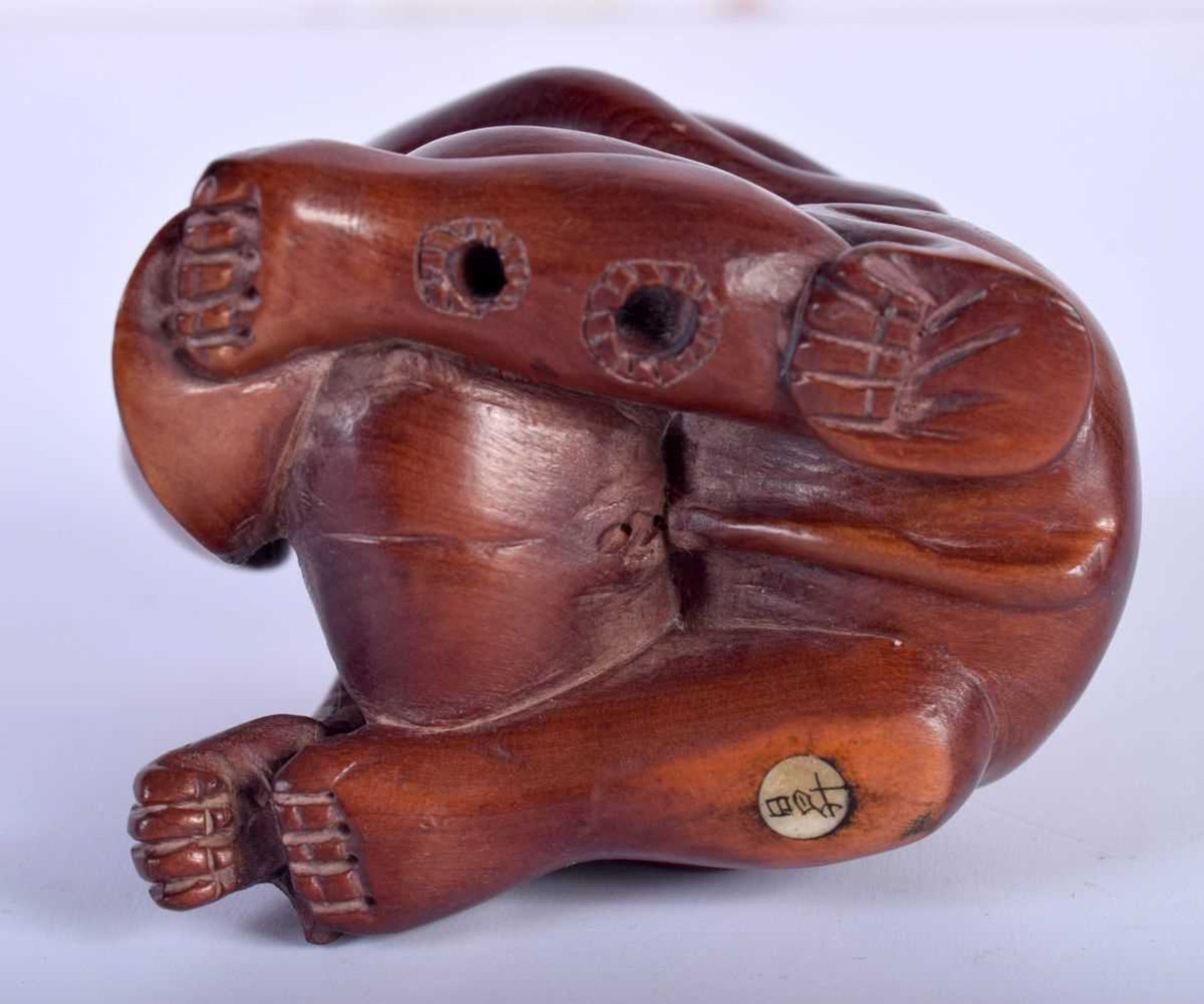 A Carved Hardwood Erotic Netsuke. 5.2cm x 5.6cm x 4.3cm. Weight 59g - Image 3 of 3