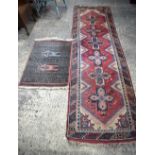 A Oriental runner together with a small Prayer rug largest 274 x 78 cm (2)