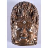 AN 18TH/19TH CENTURY SINO TIBETAN SILVER INLAID BRONZE MASK formed as a scowling male deity. 14 cm x