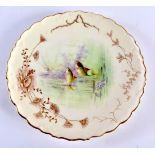 Late 19th early 20th century Coalport plate painted with swimming Barbel on a light yellow ground,