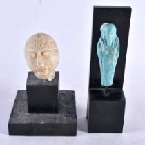 AN EARLY MIDDLE EASTERN CARVED STONE IDOL together with a blue glazed ushabti figure. Largest 18