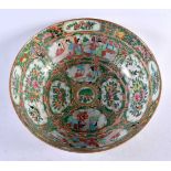 A 19TH CENTURY CHINESE CANTON FAMILLE ROSE PORCELAIN BOWL Qing, painted with figures and landscapes.