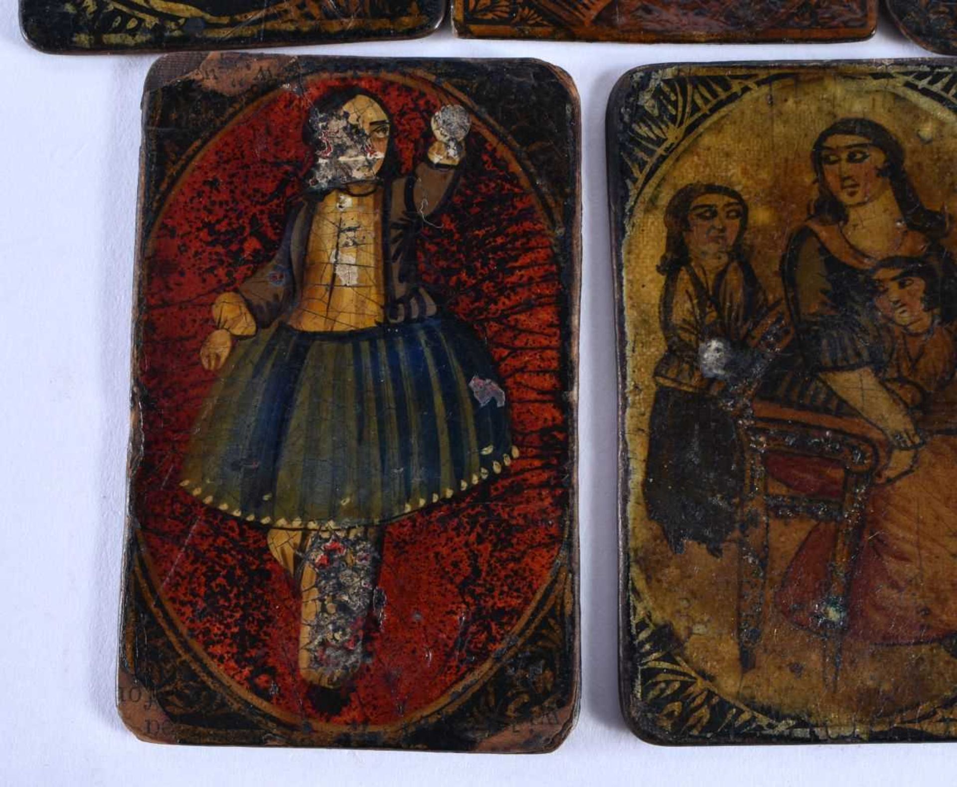 AN UNUSUAL SET OF SEVEN 19TH CENTURY PERSIAN IRANIAN QAJAR LACQUER PAINTINGS depicting figures and - Image 5 of 6