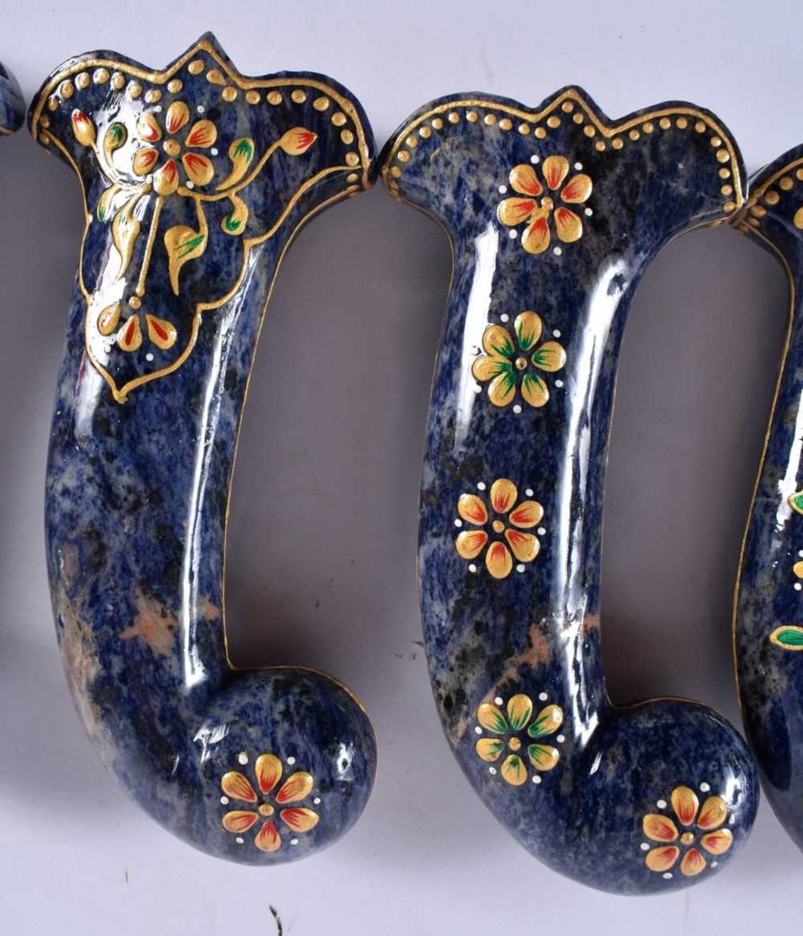 A SET OF FIVE MIDDLE EASTERN QAJAR LACQUER HARDSTONE DAGGER HANDLES overlaid with foliage and vines. - Image 3 of 6