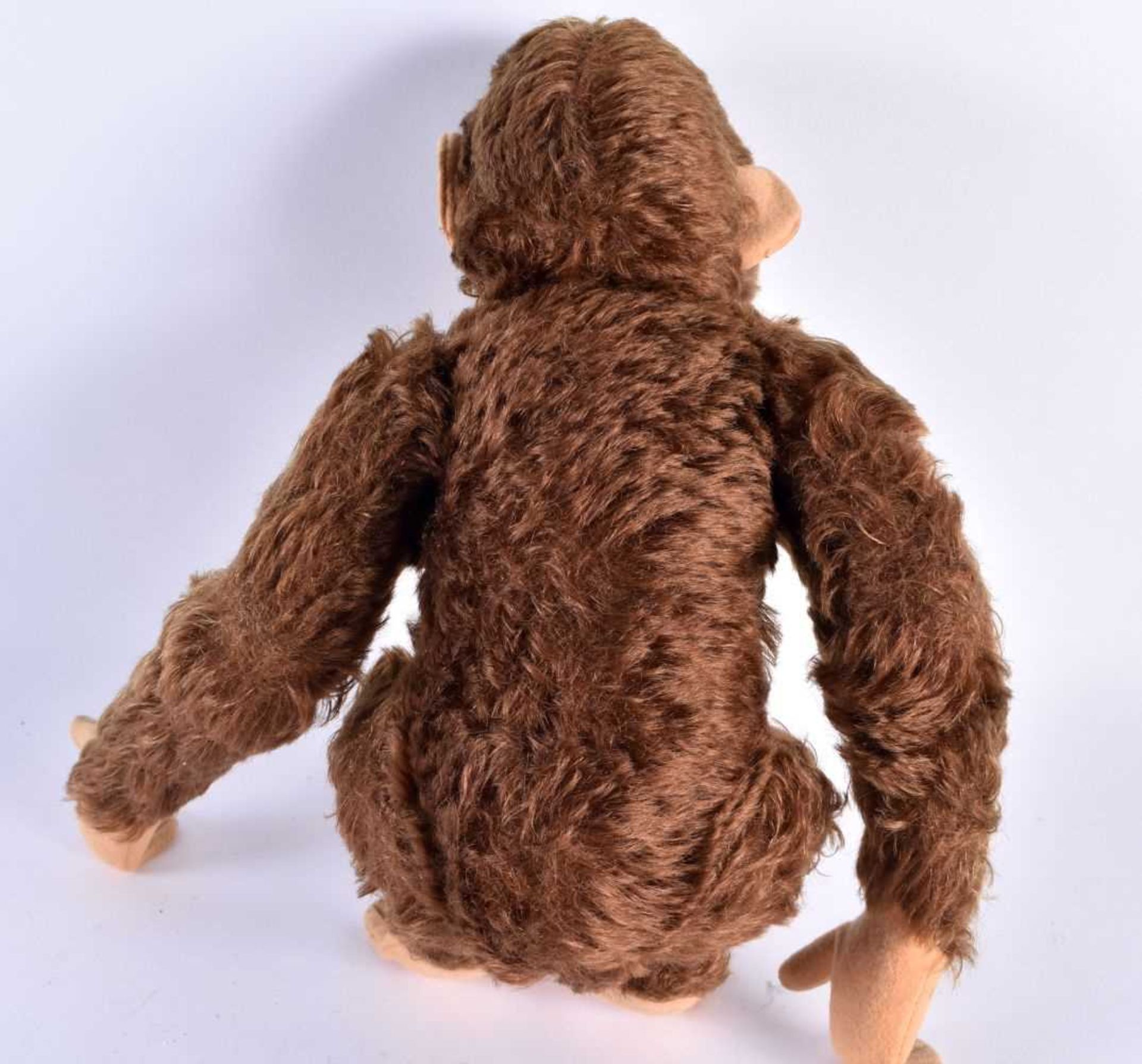 A MID CENTURY POSSIBLE STEIFF MONKEY WITH SQUEAKER. 25 cm high. - Image 4 of 5