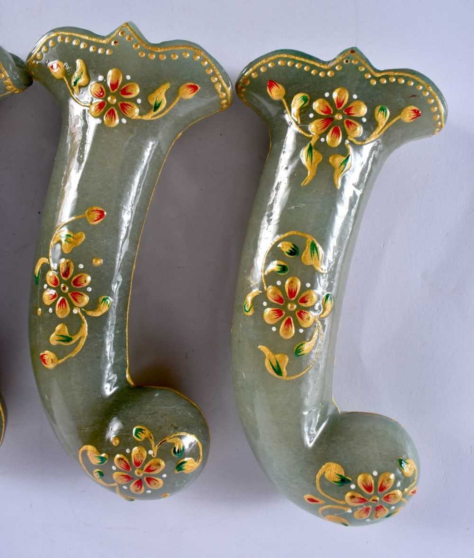 A SET OF FIVE MIDDLE EASTERN QAJAR LACQUER HARDSTONE DAGGER HANDLES overlaid with foliage and vines. - Image 2 of 6