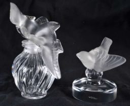 A LALIQUE GLASS SCENT BOTTLE together with a Lalique glass bird. Largest 11 cm high. (2)