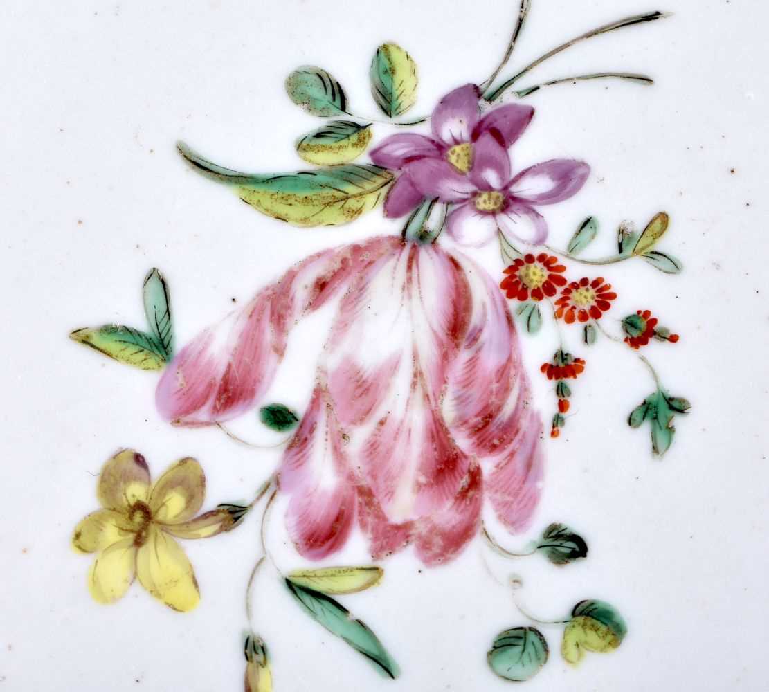 18th century Bristol plate with entwined ribbon border painted with a central flower, chains of - Image 2 of 3