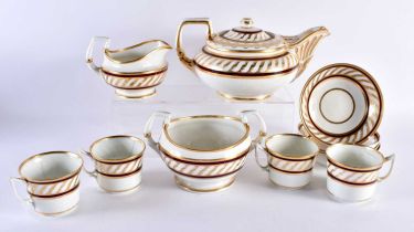 Derby part tea set, a teapot and cover, sugar bowl, cream jug, and four cups and saucers decorated