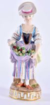 AN ANTIQUE GERMAN MEISSEN PORCELAIN FIGURE OF A FEMALE modelled holding baskets of flowers. 18 cm