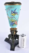 A LARGE VICTORIAN BLUE OPALINE AESTHETIC MOVEMENT GLASS VASE upon a bronze base. 38 cm high.