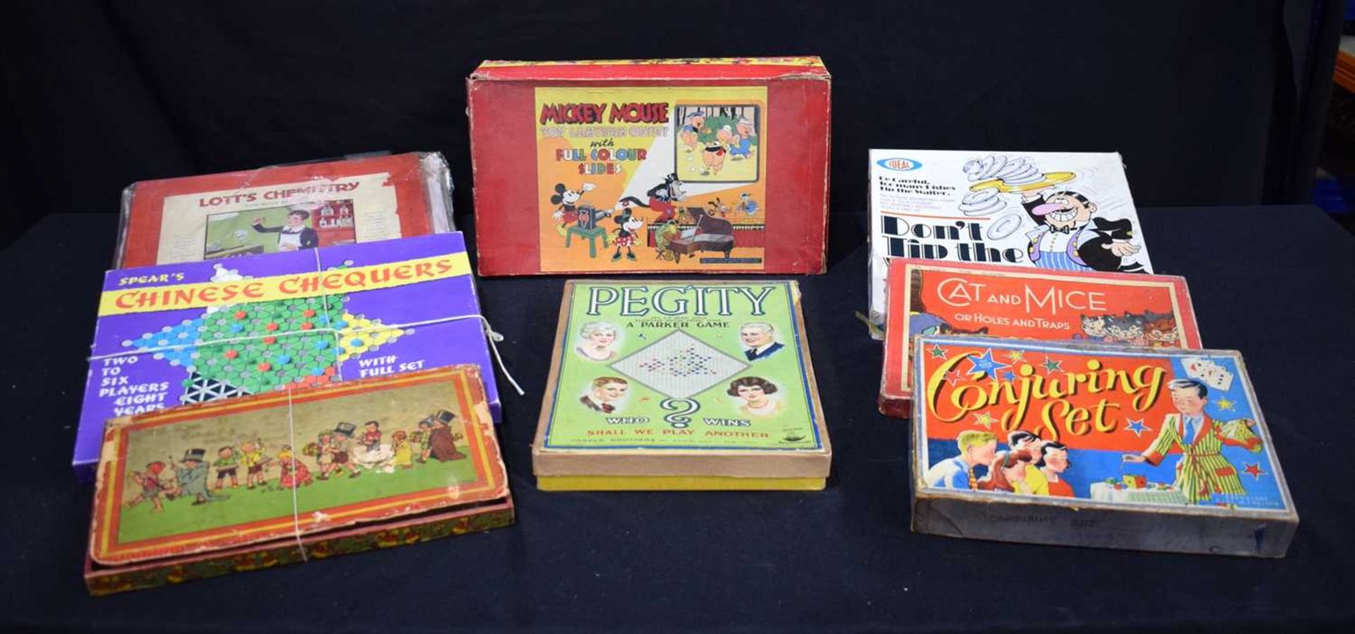 A collection of vintage games and a Micky Mouse boxed Toy Lantern toy