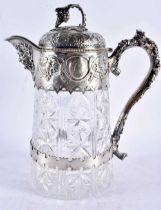 A FINE LARGE VICTORIAN SILVER PLATED CUT GLASS CLARET JUG Attributed to Elkington & Co. 27 cm x 18