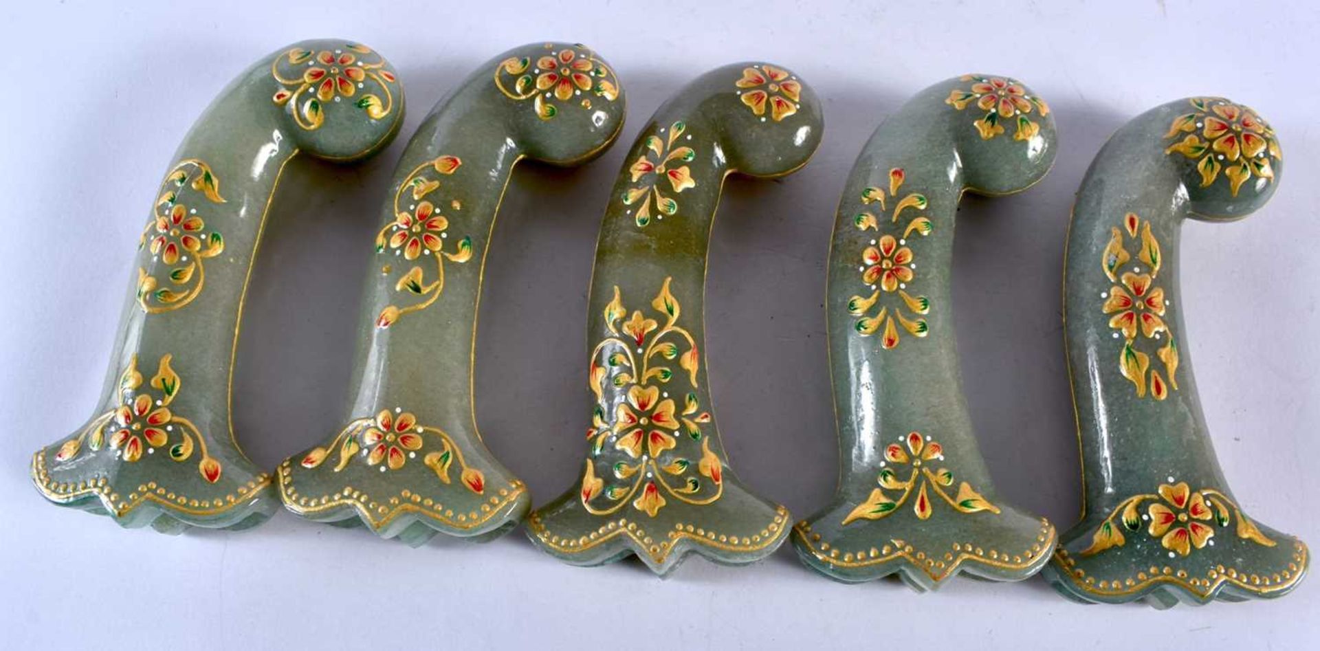 A SET OF FIVE MIDDLE EASTERN QAJAR LACQUER HARDSTONE DAGGER HANDLES overlaid with foliage and vines. - Image 5 of 6