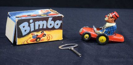 A boxed Biller Blech Tinplate wind up Bimbo clown car .12 x 8 cm.