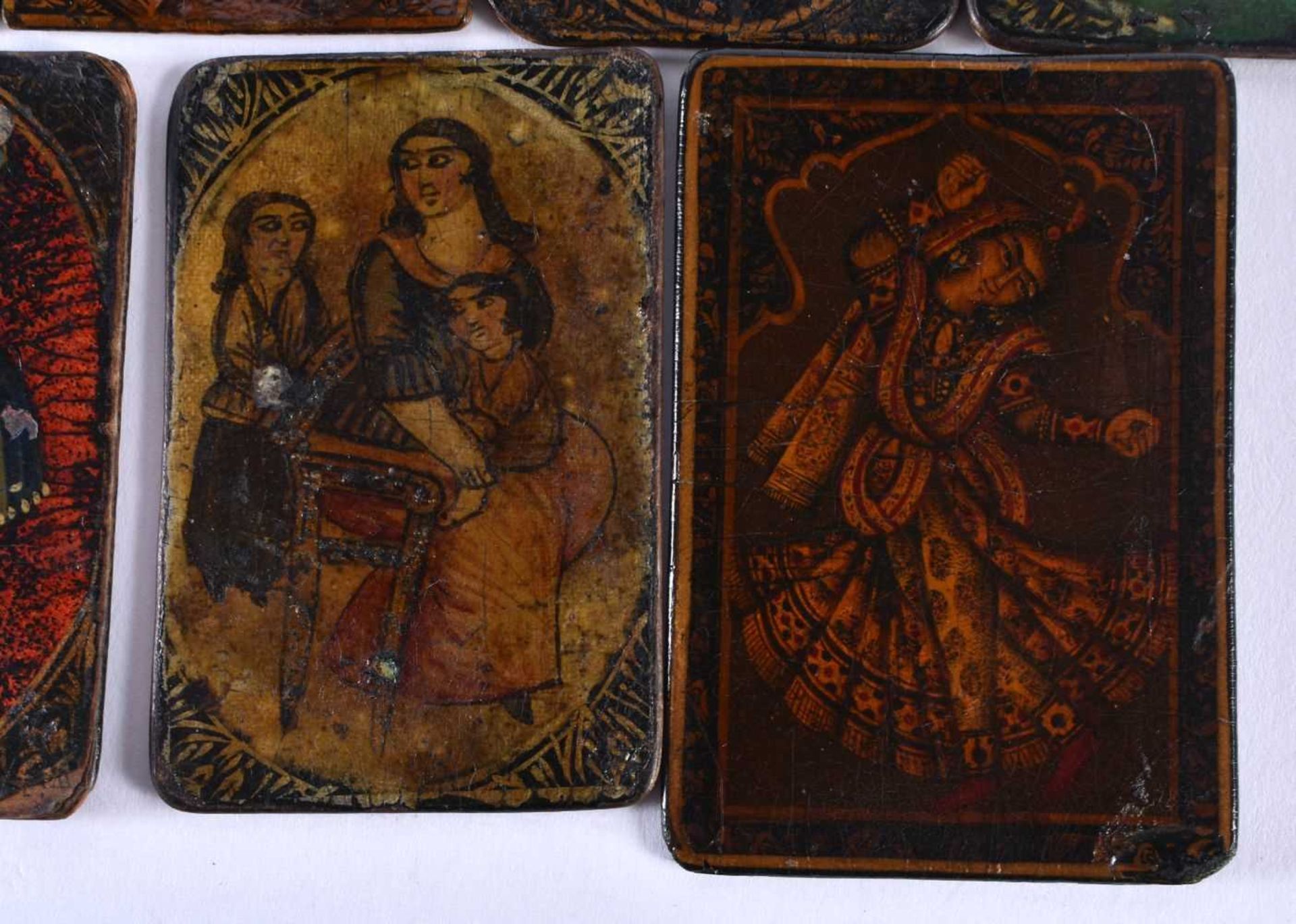 AN UNUSUAL SET OF SEVEN 19TH CENTURY PERSIAN IRANIAN QAJAR LACQUER PAINTINGS depicting figures and - Image 4 of 6