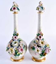 19th century Chamberlain’s Worcester good pair of floral encrusted scent bottles with stoppers. 23cm