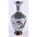 A 19TH CENTURY CHINESE CLOISONNE ENAMEL VASE Qing, decorated with a dragon pursuing a flaming pearl.