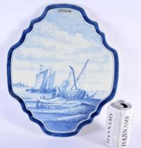 A LARGE DUTCH DELFT POTTERY BLUE AND WHITE PLAQUE painted with boating scenes. 36 cm x 28 cm.
