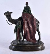 After Carl Kauba (20th Century) Cold painted bronze, Two figures upon a camel. 21 cm x 16 cm.