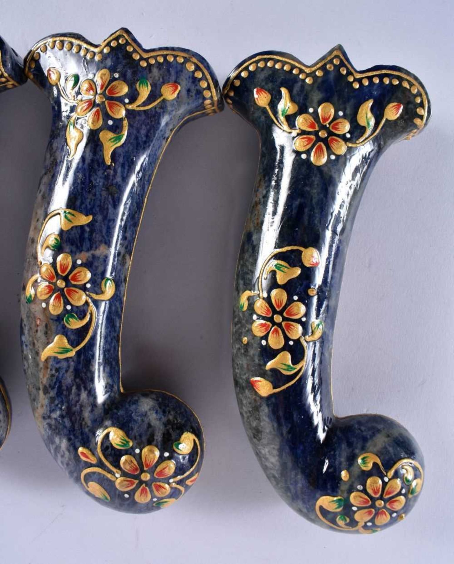 A SET OF FIVE MIDDLE EASTERN QAJAR LACQUER HARDSTONE DAGGER HANDLES overlaid with foliage and vines. - Image 2 of 6