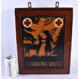 A RARE GERMAN FIRST AID MEDICAL HANGING CABINET depicting a figure and deer within a landscape. 42