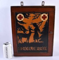 A RARE GERMAN FIRST AID MEDICAL HANGING CABINET depicting a figure and deer within a landscape. 42
