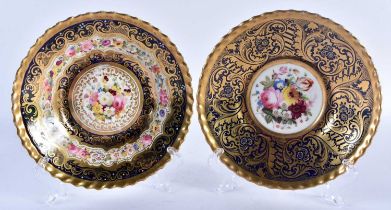 A PAIR OF EARLY 19TH CENTURY CHAMBERLAINS WORCESTER PORCELAIN SAUCER DISHES painted with flowers