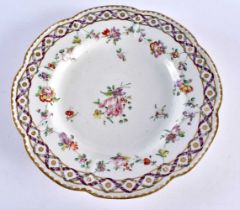 18th century Bristol plate with entwined ribbon border painted with a central flower, chains of