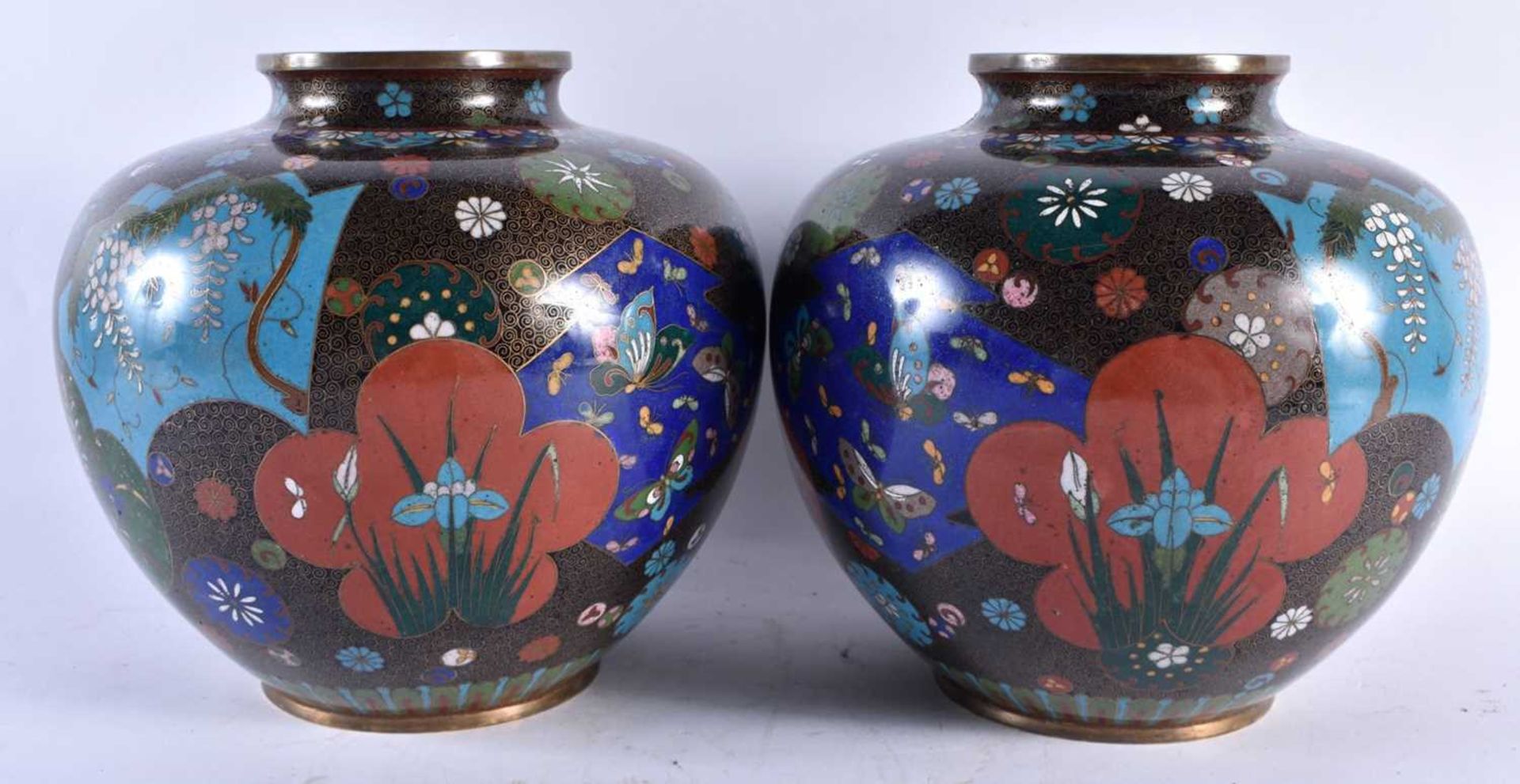 A LARGE PAIR OF 19TH CENTURY JAPANESE MEIJI PERIOD CLOISONNE ENAMEL VASES decorative with panels